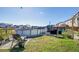 Fenced backyard with in-ground pool, lounging chairs, and well-maintained lawn at 315 Silent Bluff Dr, Summerville, SC 29486