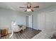 Bright bedroom featuring a ceiling fan, closet and a comfortable chair with desk at 315 Silent Bluff Dr, Summerville, SC 29486