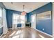 Cozy flex room with natural light, hardwood floors, and stylish decor, ready for your personal touch at 315 Silent Bluff Dr, Summerville, SC 29486