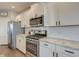 Modern kitchen featuring stainless steel appliances, granite countertops, and white subway tile backsplash at 315 Silent Bluff Dr, Summerville, SC 29486