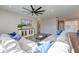 Spacious living room with large sectional couch, hardwood floors, and media center with wall-mounted television at 315 Silent Bluff Dr, Summerville, SC 29486