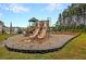 Community playground featuring slides, climbing structure, and swings for residents enjoyment at 315 Silent Bluff Dr, Summerville, SC 29486