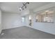 View of a finished basement area showing the carpet and a doorway to an adjacent kitchen at 337 Cessna Ave, Charleston, SC 29407