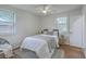 Bright bedroom with a comfortable bed, ceiling fan, and natural light from two windows at 337 Cessna Ave, Charleston, SC 29407