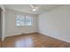 Bright bedroom featuring hardwood floors, a window, and ceiling fan at 337 Cessna Ave, Charleston, SC 29407