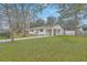 Charming home with a well-kept lawn, carport, and storage shed in the backyard at 337 Cessna Ave, Charleston, SC 29407