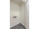Laundry room with gray tile flooring and wall-mounted utility connections at 337 Cessna Ave, Charleston, SC 29407