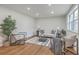 Open living area with hardwood floors, neutral decor, and stylish seating arrangement at 337 Cessna Ave, Charleston, SC 29407