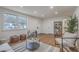 Bright living room with hardwood floors, modern furniture, and natural light at 337 Cessna Ave, Charleston, SC 29407