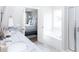 Well-lit bathroom with marble counters and a door leading to the bedroom at 338 Hillman Trail Dr, Moncks Corner, SC 29461