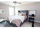 Stylish bedroom with a plush bed, chic throw pillows, and contemporary artwork at 338 Hillman Trail Dr, Moncks Corner, SC 29461