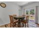 Cozy dining area with natural light and a sliding glass door to the backyard at 350 Bering Ln, Summerville, SC 29486