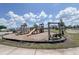Community playground with a slide, swing, and wooden play structure at 350 Bering Ln, Summerville, SC 29486