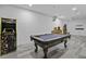 Spacious game room with hardwood floors, a pool table, and arcade game at 3592 Somerset Hills Ct, Mount Pleasant, SC 29466