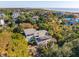 Aerial view showcasing the home's proximity to the beach, with mature trees and coastal charm at 3619 Loggerhead Ct, Seabrook Island, SC 29455