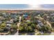 Lovely aerial view of a quaint coastal neighborhood home surrounded by trees, beach nearby at 3619 Loggerhead Ct, Seabrook Island, SC 29455