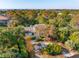 Aerial view of the property showcases lush trees, driveway, and beautiful neighborhood at 3619 Loggerhead Ct, Seabrook Island, SC 29455