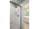 Modern bathroom featuring a glass enclosed shower and a view to the vanity at 3619 Loggerhead Ct, Seabrook Island, SC 29455