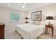 Comfortable bedroom featuring a ceiling fan, lamps, and a window at 3619 Loggerhead Ct, Seabrook Island, SC 29455