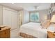 Cozy bedroom featuring a ceiling fan, natural light, and neutral color palette at 3619 Loggerhead Ct, Seabrook Island, SC 29455