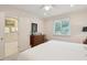 Bright bedroom with ensuite bathroom and natural light at 3619 Loggerhead Ct, Seabrook Island, SC 29455