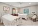 Guest bedroom featuring two twin beds with white linens, natural light, and neutral paint at 3619 Loggerhead Ct, Seabrook Island, SC 29455