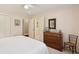 Comfortable bedroom with access to the ensuite bathroom and closet at 3619 Loggerhead Ct, Seabrook Island, SC 29455