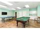 Community game room with a pool table, ping pong, TV and kitchenette at 3619 Loggerhead Ct, Seabrook Island, SC 29455