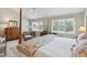 Tranquil main bedroom filled with natural light from the large windows at 3619 Loggerhead Ct, Seabrook Island, SC 29455