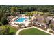 Community swimming pool featuring ample lounge chairs, a covered gazebo and palm trees at 3619 Loggerhead Ct, Seabrook Island, SC 29455