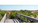 Elevated beach access walkway with wooden railing at 3619 Loggerhead Ct, Seabrook Island, SC 29455