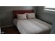 Cozy bedroom with a comfortable bed, featuring a patterned comforter and decorative pillows at 40 Bee St # 112, Charleston, SC 29403
