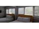 Bedroom with a comfortable bed, mirrored closet, and natural light streaming through the window at 40 Bee St # 309, Charleston, SC 29403