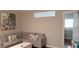 Inviting living room featuring a comfortable gray sectional and stylish decor at 40 Bee St # 309, Charleston, SC 29403