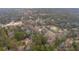 A serene aerial view of a charming town nestled among lush trees and picturesque landscapes at 415 W Carolina Ave, Summerville, SC 29483