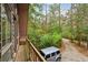 View from balcony of silver Jeep parked along wooded drive at 415 W Carolina Ave, Summerville, SC 29483