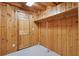 Walk-in closet with wood paneling, shelving, and carpeting at 415 W Carolina Ave, Summerville, SC 29483