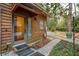 Inviting entrance featuring a glass front door, house number, and a warm welcome mat at 415 W Carolina Ave, Summerville, SC 29483