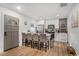 Modern kitchen featuring a central island with seating and stainless steel appliances, perfect for entertaining at 4530 Holly St, North Charleston, SC 29405