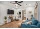 Comfortable living room with stylish decor, featuring a large television and cozy seating area at 4530 Holly St, North Charleston, SC 29405