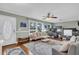 Cozy living room featuring hardwood floors, stylish furniture, and an open layout at 6017 Ridgecrest Ave, Hanahan, SC 29410