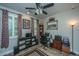 Bedroom with ceiling fan, wood floors, and furniture perfect for a home office at 616 W 2Nd N St, Summerville, SC 29483