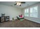 Bedroom featuring carpet, ceiling fan, and natural light at 616 W 2Nd N St, Summerville, SC 29483