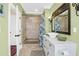 Well-lit bathroom with tiled shower, stylish vanity, vessel sink, and modern fixtures at 6902 Tanner Hall Blvd, Hanahan, SC 29410