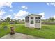 Backyard gazebo with screened enclosure and views of the garden and lawn at 1062 Friartuck Trl, Ladson, SC 29456