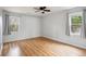 This bedroom features neutral walls, attractive laminate floors, and a ceiling fan at 112 Chownings Ln, Goose Creek, SC 29445