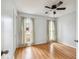 Bedroom with laminate floors and large windows for natural light at 112 Chownings Ln, Goose Creek, SC 29445