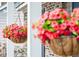 Close-up of the front porch showing hanging flower baskets that add a touch of color and beauty at 112 Chownings Ln, Goose Creek, SC 29445