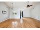 Bright living room featuring hardwood floors, a ceiling fan, neutral walls and natural light from the exterior at 112 Chownings Ln, Goose Creek, SC 29445