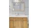 Classic bathroom featuring a wood vanity and white countertops, with a large mirror and recessed lighting at 1137 Windsome Pl, Mount Pleasant, SC 29464